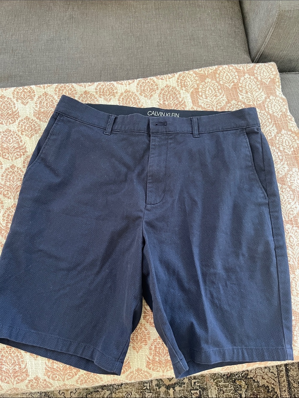 Calvin Klein Men’s Navy Flat-Front Shorts 8” inseam. Slim fit